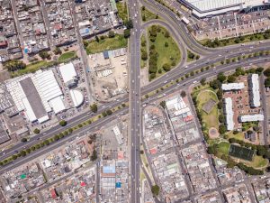 Foreign brand entry into African markets — aerial view of a busy Lagos commercial district